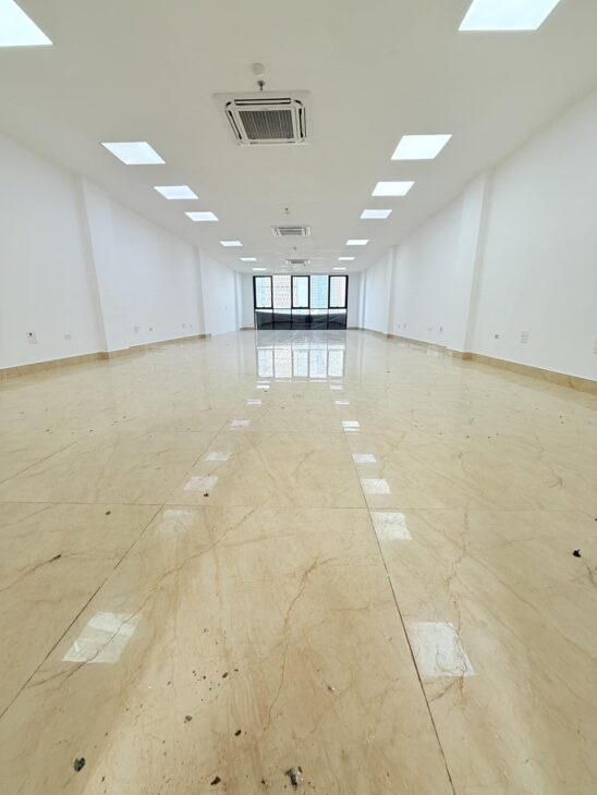 TÒA VĂN PHÒNG-Mặt phố Trần Vỹ (Lê Đức Thọ) 136m2/ 9T Thang máy, MT 6.5m – 78 Tỷ