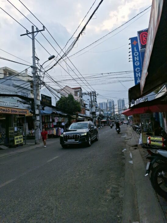 Nhà 4 tầng, Ngay Khu Chế Xuất Tân Thuận, thu nhập Gần 1 tỷ/Năm, 121m2, mặt tiền Bùi Văn